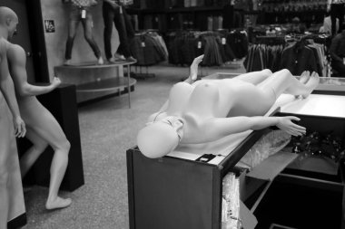 Mannequins. Naked Mannequins in a clothing store.  mannequins without clothes in a shop. Naked plastic dummies  in a store.