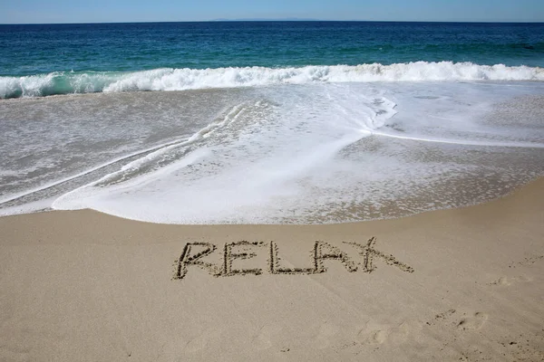 Relax Written Sand Beach Message Handwritten Smooth Sand Beach — стоковое фото