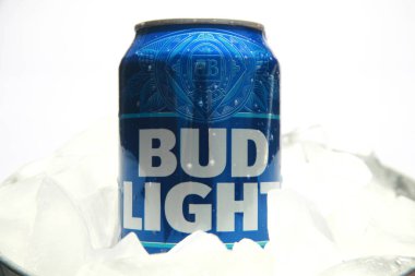 Lake Forest, California - USA - April 29, 2023: Bud Light. Aluminum can of Bud Light. A boycott was spurred by a sponsorship the company did with Dylan Mulvaney a transgender activist. Editorial. clipart