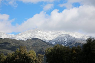 Saddle Back Mountain with snow. Rancho Santa Margarita, California. February 26, 2023 Rare View of Snow on Saddle Back Mountain in Orange County California. A cold winter storm covers Saddleback.