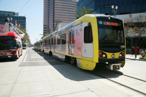 stock image Long Beach - California - USA - April 19, 2023: Bus Line in Long Beach California. Busses take people to various places on their routes throughout the city. People easily get on and off a Bus daily.