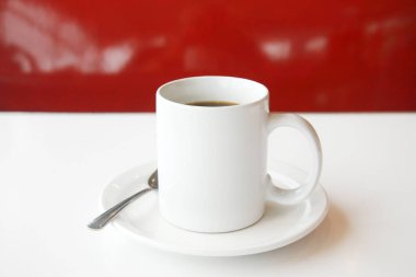 - Kahve. Bir fincan kahve. Eski bir mutfak masasında kahve fincanı. Sütlü beyaz fincan kahve. Günaydın, beni al. Bir fincan Joe. Kafein. Krema ve şekerli Java. Seramik bardakta espresso..