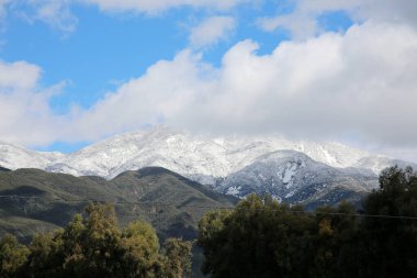 Saddle Back Mountain with snow. Rancho Santa Margarita, California. February 26, 2023 Rare View of Snow on Saddle Back Mountain in Orange County California. A cold winter storm covers Saddleback.
