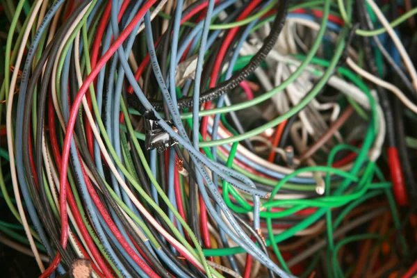 stock image Lake Forest, California - USA - May 7 2023: Copper wire. Scrap electrical wire for recycling. Old electrical wire. Messy pile of colorful cables network chaos of multicolor wires. Construction waste