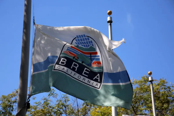 Brea California City Flag. The official Brea City Flag flying half mast in memory of a tragic school shooting in a different state. Brea California is a beautiful city with lots of amazing history.