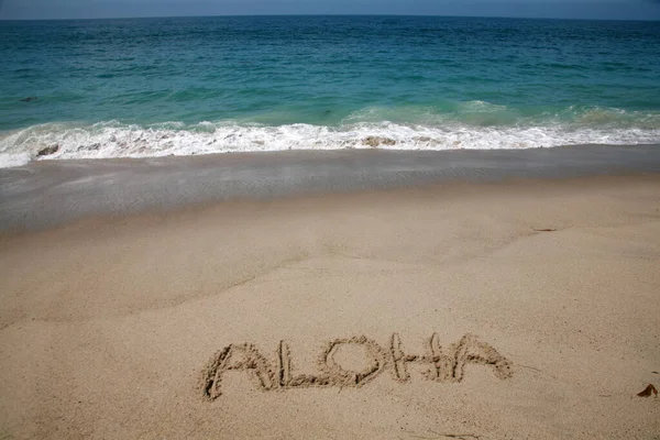 Das Wort Aloha Sand Strand Von Hawaii — Stockfoto