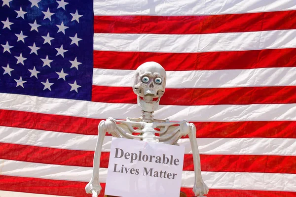 Human Skeleton Holding Deplorable Lives Matter Sign Photo Booth — Stock Photo, Image