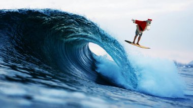 Noel Baba 'da sörf. Noel Baba Noel tatilindeyken sörf yapmaktan hoşlanır. Noel Baba dev bir okyanus dalgasında sörf yapıyor. Noel Tatili Kutlaması. İyi tatiller. Mevsimler Selamlar. Kış tatili Egzotik tatiller. Noel sezonu. Neşe.