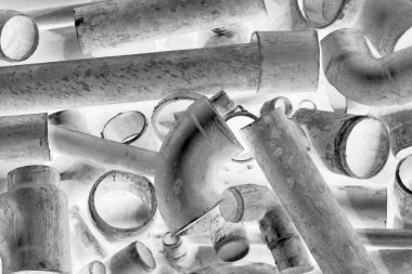 Bakır. Geri dönüşüm için bakır hurdası. Bakır tesisat. Hurda bakır metal. Geri dönüşüm tesisinde bakır borular yeniden erimeye hazır. Bakır hurda metal. Çeşitli tesisat parçaları. geri dönüşüm için hurda metal.