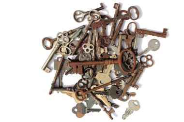 İskelet anahtarlar. Eski iskelet anahtarlar. Beyazda izole edilmiş. Çeşitli Kilitler için bir yığın Vintage Skeleton Keys. Başarının anahtarını çeşitli anahtarlardan seçmek. Kalbimin anahtarı. Başarının anahtarı. Yaşamın Anahtarı.