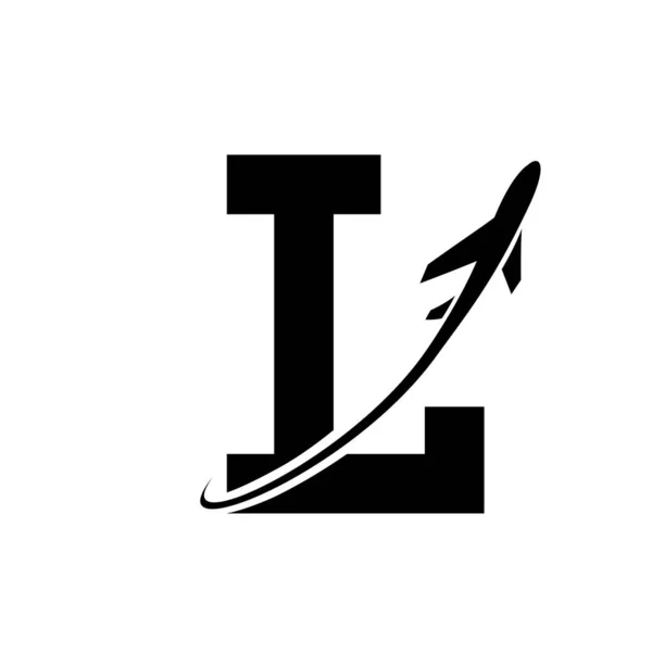 Black Antique Letter L Icon with an Airplane on a White Background