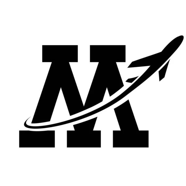 Black Antique Letter M Icon with an Airplane on a White Background