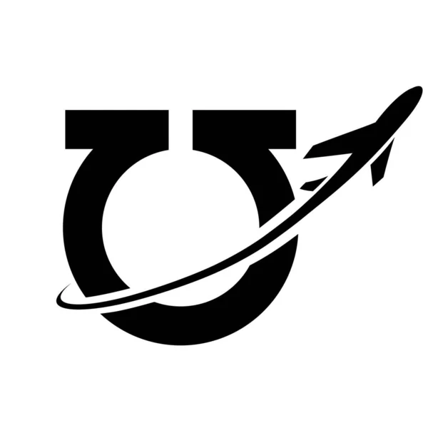 Black Antique Letter U Icon with an Airplane on a White Background