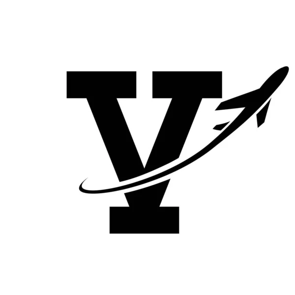 Black Antique Letter V Icon with an Airplane on a White Background
