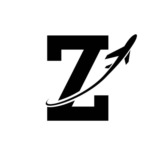 Black Antique Letter Z Icon with an Airplane on a White Background