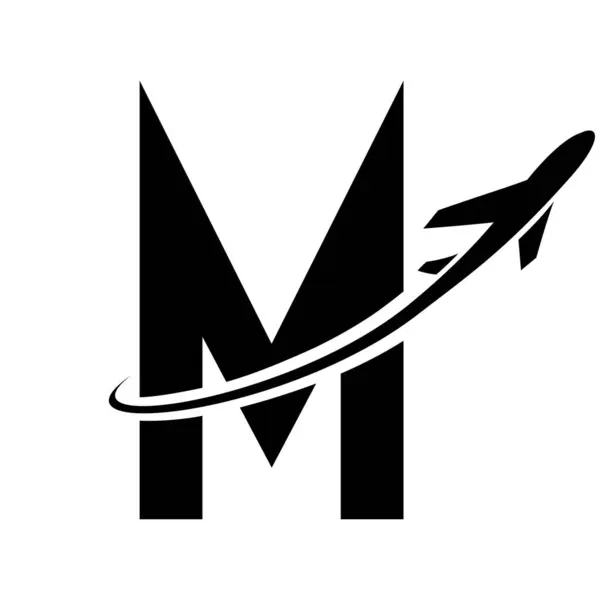 Black Futuristic Letter M Icon with an Airplane on a White Background