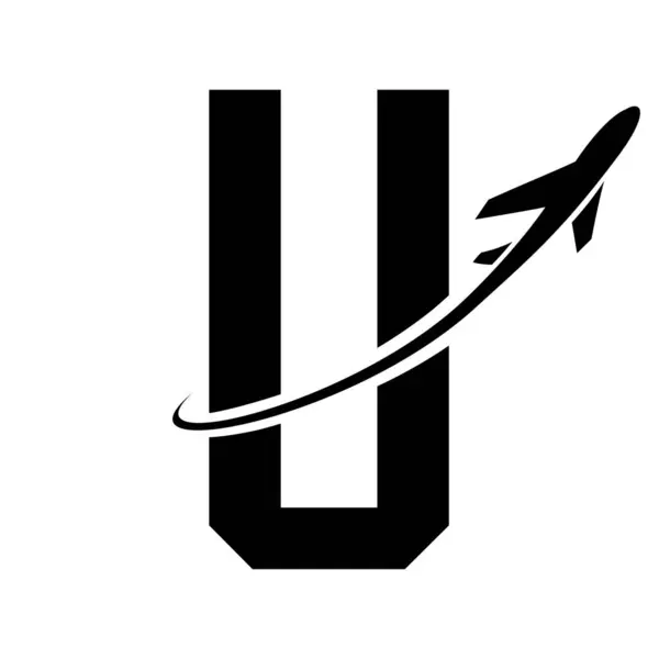 Black Futuristic Letter U Icon with an Airplane on a White Background