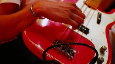 Stage lights.Musical background.Playing bass guitar and concert concept. Live music background.Concert and music festival.Instrument on stage and band.