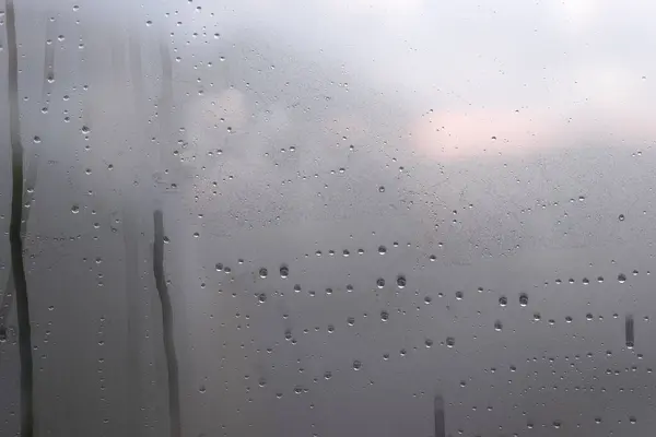 Kaupunkinäkymä Ikkunasta Sateisena Päivänä Sade Putoaa Ikkunalasiin kuvapankkikuva