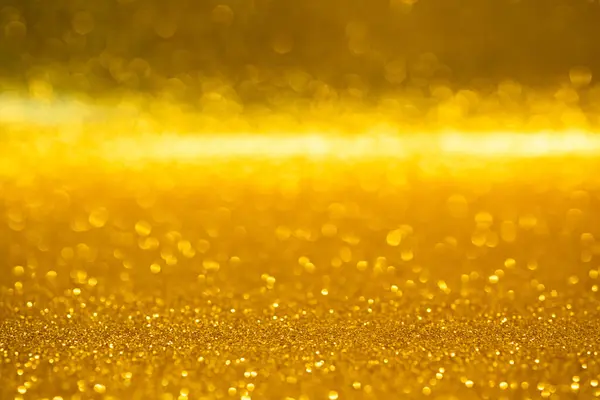 Goldener Glitzerhintergrund Defokussiert Und Weich Fokussiert Schöne Abstrakte Glänzende Licht Stockbild