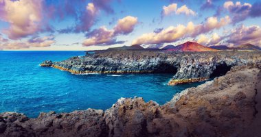 Scenic landscape Los Hervideros lava's caves in Lanzarote island,landmark in Canary islands. clipart