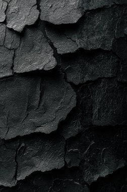 Tasarım için arka plan olarak siyah çimento desenli çatlamış beton duvar.