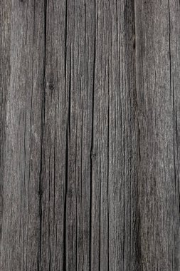 Eskimiş kahverengi ahşap zemin, grunge tarzında koyu doğal ahşaptan yapılmış. Yukarıdan manzara. Kozalaklı çam ağacının doğal ham düzlemli dokusu. Düz atış yapmak için masanın yüzeyi.