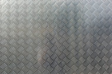 Pırlanta desenli pürüzsüz metal taban.