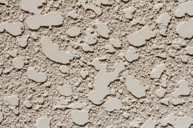 Fresh concrete wall in the construction site, gray wall with cement floor, construction background renovation process, abstract. clipart