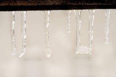icicles on a roof in a macro view