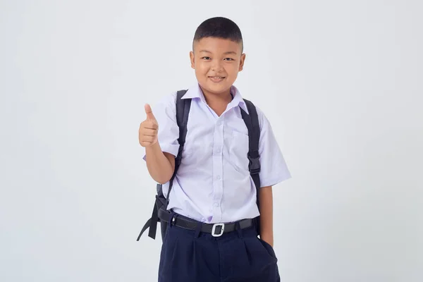 Porträts Von Asiatischen Jungen Thailändischen Landes Schuluniform Isoliert Auf Weißem lizenzfreie Stockbilder