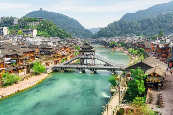 stock image Fenghuang, China - September 23, 2017: Awesome aerial view of Phoenix Ancient Town and the Tuojiang River (Tuo Jiang River). Fenghuang is a popular tourist destination of Asia.