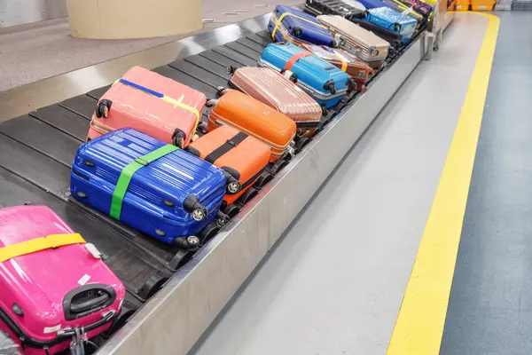 Bright Colorful Suitcases Bags Luggage Conveyor Belt Arrival Area Passenger —  Fotos de Stock
