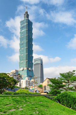 Taipei, Taiwan - April 26, 2019: Awesome view of Taipei 101 (Taipei World Financial Center) in downtown. The tower is a supertall skyscraper and a landmark of Taiwan. Amazing cityscape. clipart
