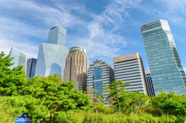 Seoul, South Korea - October 14, 2017: Amazing view of skyscrapers and other modern buildings from Yeouido Park. Yeoui Island is the main finance and investment banking district of Seoul. clipart