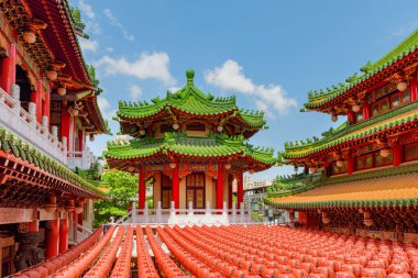 Kaohsiung, Taiwan - April 30, 2019: Awesome colorful view of Sanfeng Temple decorated with traditional Chinese red lanterns. The old temple is a popular attraction among tourists and pilgrims of Asia. clipart