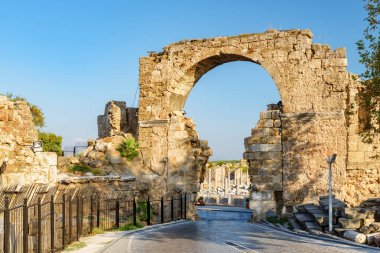 Awesome view of the Vespasian Gate in Side, Turkey. Amazing ruins of the ancient city are a popular tourist attraction of the world. clipart
