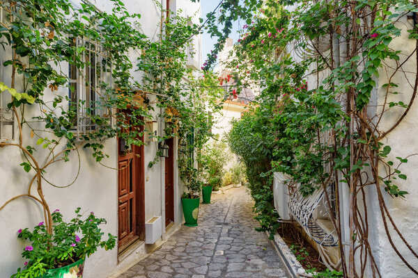 Awesome view of a cozy narrow street in Marmaris, Turkey. Scenic white houses of the old town. The port city is a popular tourist destination in the Turkish Riviera.