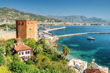 Awesome view of the Kizil Kule by the Mediterranean Sea in Alanya, Turkey. The Red Tower is a popular tourist attraction in Turkey.