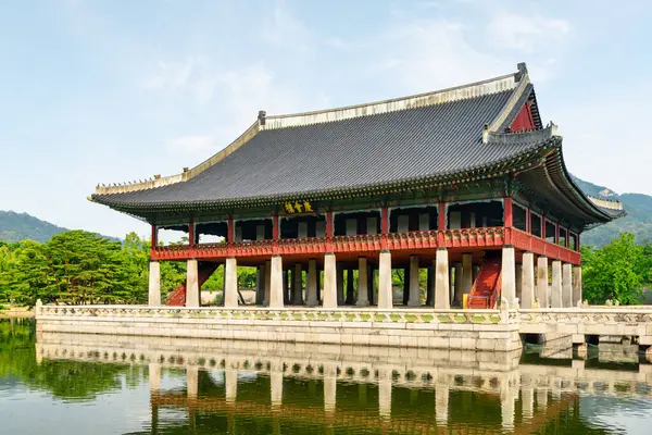 stock image Gyeonghoeru Pavilion at Gyeongbokgung Palace in Seoul, South Korea. Sign 