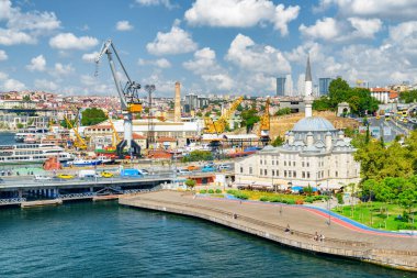 View of the Sokollu Mehmed Pasha Mosque and the Ataturk Bridge over the Golden Horn in Istanbul, Turkey. Amazing cityscape. Istanbul is a popular tourist destination of the world. clipart