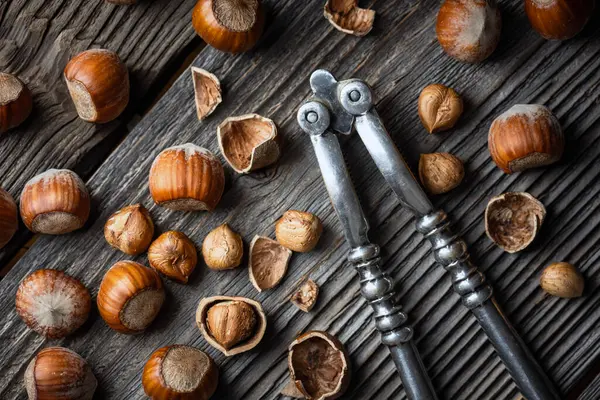 Hazelnuts Classic Silver Nutcracker Wooden Table Food Photography — Stock Photo, Image