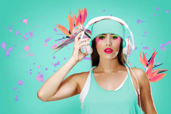 Young Woman Listening Music Headphones Surrounded Vibrant Splashes Paint Bird — Stock Photo, Image