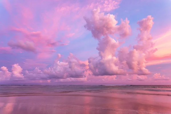 stock image Pink sky with clouds and ocean. Sunset scenery. Bali island, Indonesia. Wallpaper background. Natural scenery. Romantic relax place.