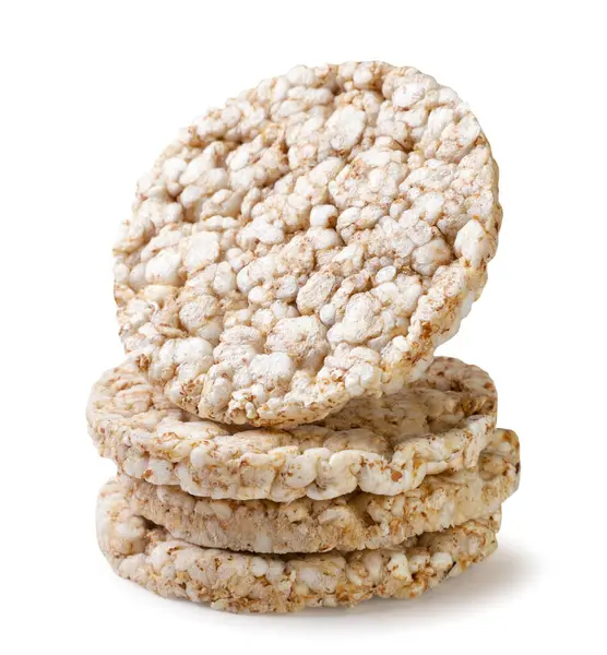 Beyaz arka planda çıtır çıtır pirinç kekleri. İzole edilmiş