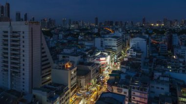 Bangkok, Tayland 'daki kentsel binalarla ufuk çizgisinin zamanlaması.