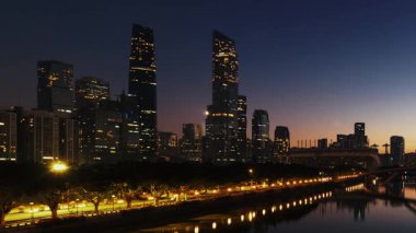 Guangzhou şehrinin ufuk çizgisi gün batımı zaman çizelgesi görüntüsü Çin 'de