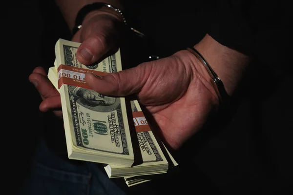 Hombre Detenido Sosteniendo Dinero Esposado Contra Fondo Negro Como Símbolo — Foto de Stock