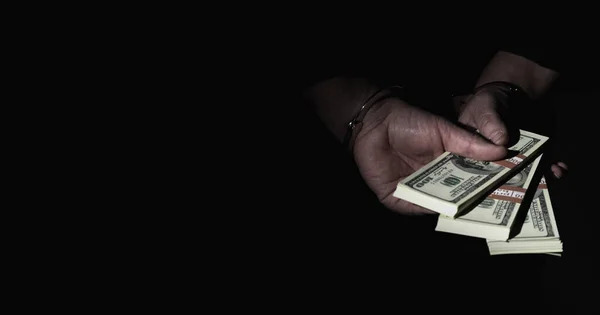 Arrested Man Holding Money Handcuffs Symbol Corruption Illegal Gratuities Copy — Stock Photo, Image