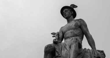 Antique god of commerce, merchants and travelers Hermes (Mercury).  Copy space. Black and wwhite image.
